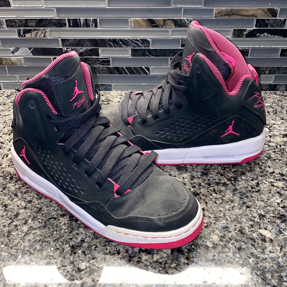 Pink and black Jordan flights